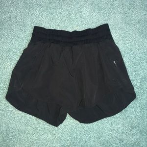 black lululemon athletic shorts